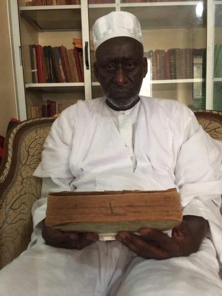 Ceerno Madani in his family library